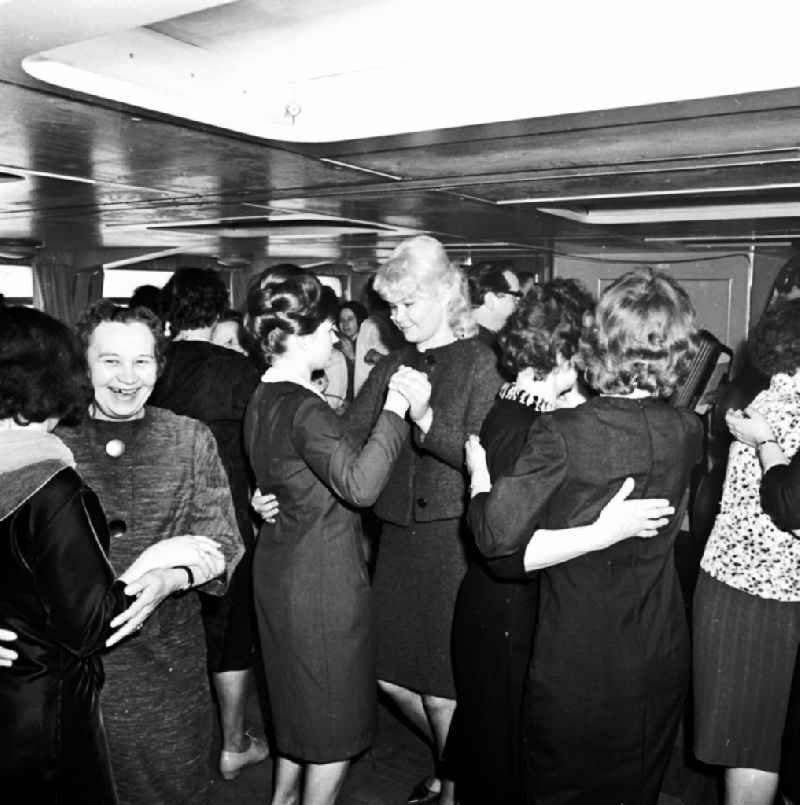 Leisure time fun and dance event on the passenger ship Weisse Flotte excursion steamer Heinrich Mann in the district Treptow in Berlin, the former capital of the GDR, German Democratic Republic