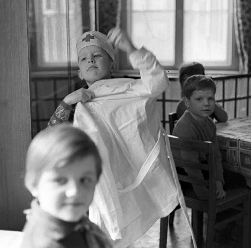 Actress Valentina Malyavina with children during the shooting of the film Ivan's Childhood in Berlin, the former capital of the GDR, German Democratic Republic