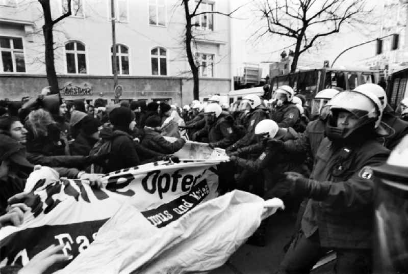 Anti-fascist protests / actions against the NPD march on Oranienburgerstrasse near the New Synagogue during the Second Wehrmacht Exhibition in the Mitte district of Berlin. Demonstrators and police clash