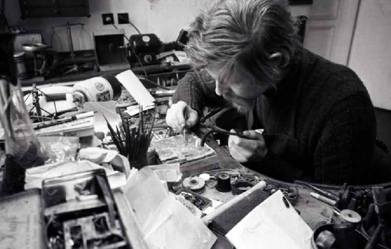 Goldsmith at work making jewelry in the district Mitte in Berlin, the former capital of the GDR, German Democratic Republic