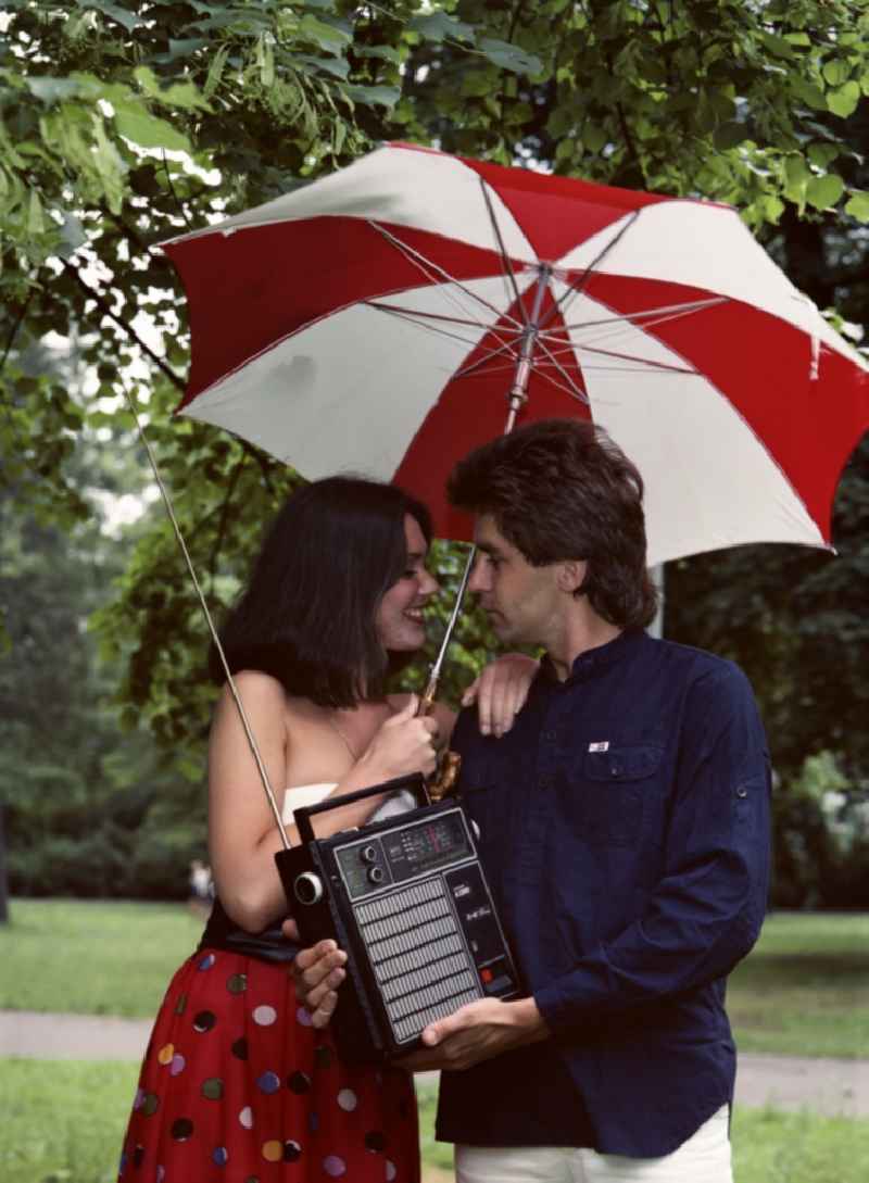 Young couple on a walk with a radio receiver Steratrans R 230