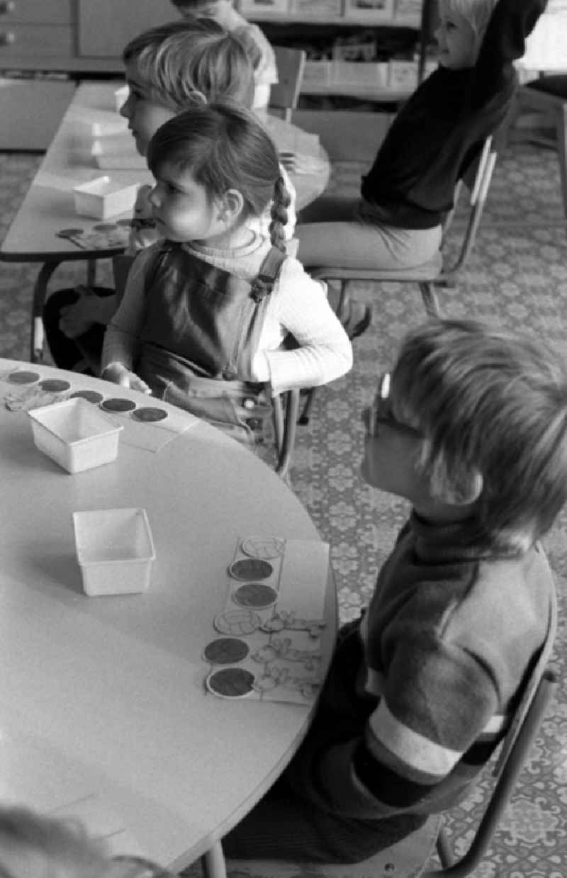 Games and fun with toddlers in kindergarten in the district Mitte in Berlin Eastberlin, the former capital of the GDR, German Democratic Republic
