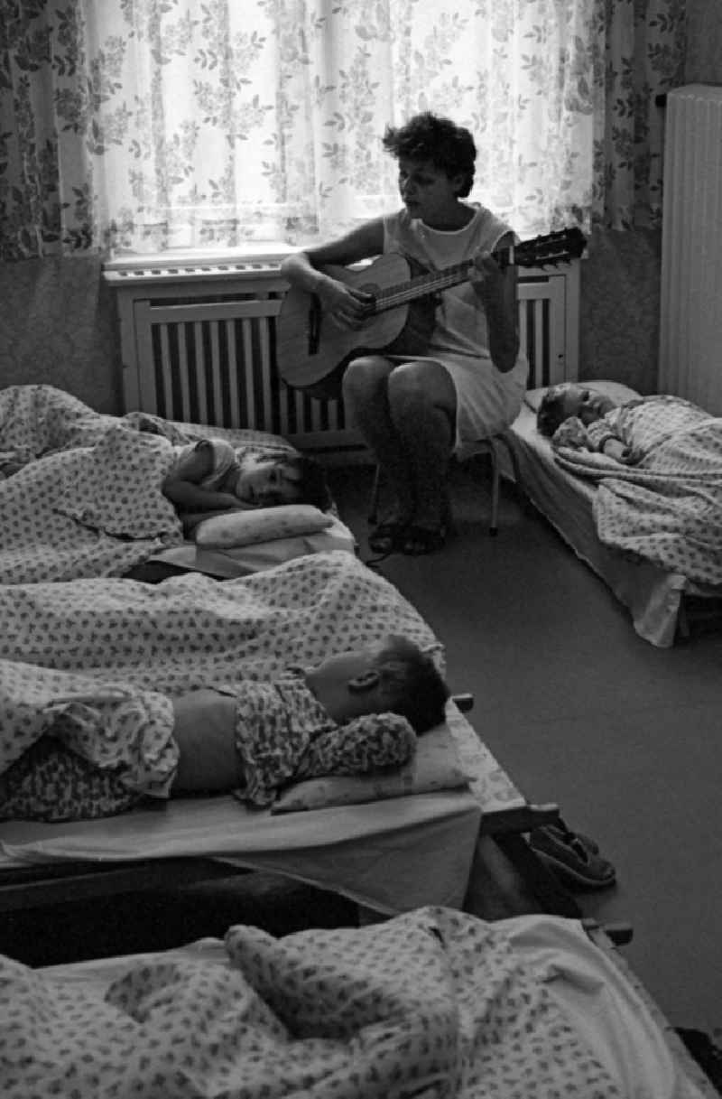 Games and fun with toddlers in kindergarten during the afternoon nap in Berlin Eastberlin, the former capital of the GDR, German Democratic Republic