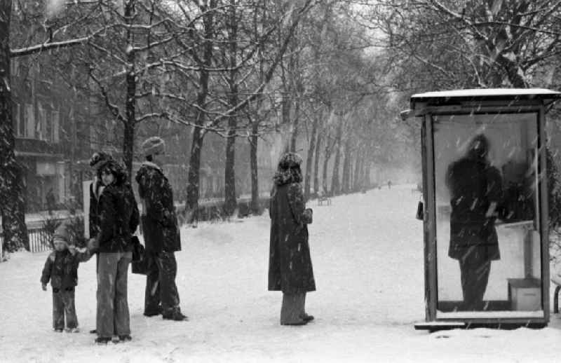 Use of a telecommunication device at a public payphone in Berlin Eastberlin on the territory of the former GDR, German Democratic Republic