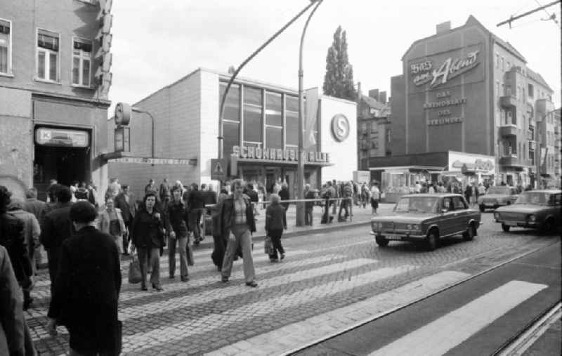 Car - motor vehicle of the type Lada and Wartburg in traffic waiting in front of a pedestrian crossing in Berlin East Berlin on the territory of the former GDR, German Democratic Republic. In the background, the Schoenhauers Allee S-Bahn station