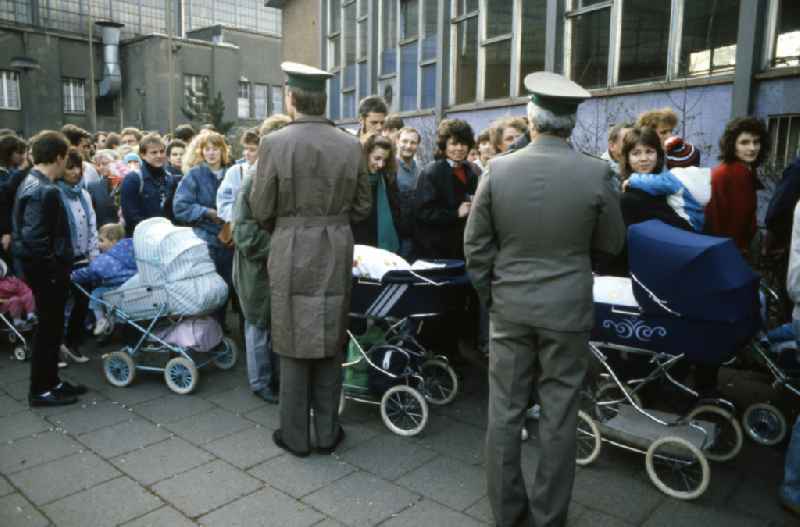 Queues of people and crowds of GDR citizens at the palace of tears of the GueSt passport control point and border crossing point at the Friedrichstrasse S-Bahn station in Berlin East Berlin on the territory of the former GDR, German Democratic Republic