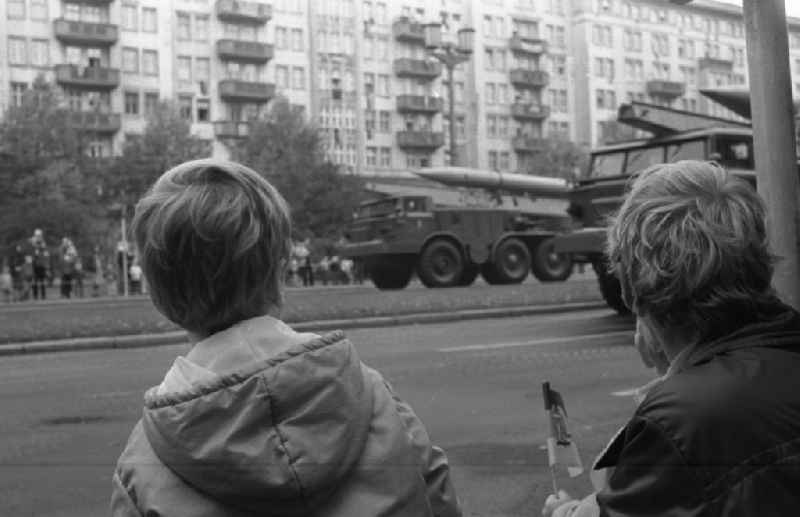 Parade ride of military and combat technology of the tank troops of the NVA National People's Army for the national holiday on Karl-Marx-Allee in the district of Friedrichshain in Berlin East Berlin on the territory of the former GDR, German Democratic Republic