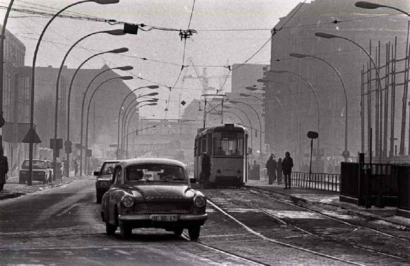 Car - motor vehicle on the road 'Wartburg 311' in Friedrichstrasse in front of a tram in the district of Mitte in Berlin East Berlin on the territory of the former GDR, German Democratic Republic