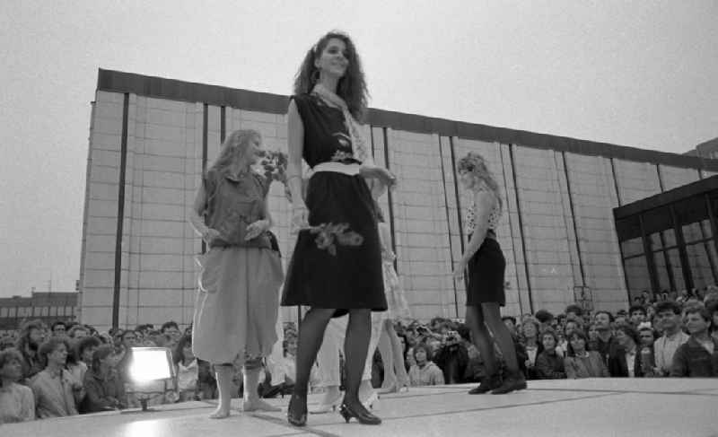 Event and demonstration for the 'Wahl Miss Fruehling' in the district of Marzahn in Berlin East Berlin on the territory of the former GDR, German Democratic Republic. Young girls and women present new swimwear and bikinis on the fashion catwalk