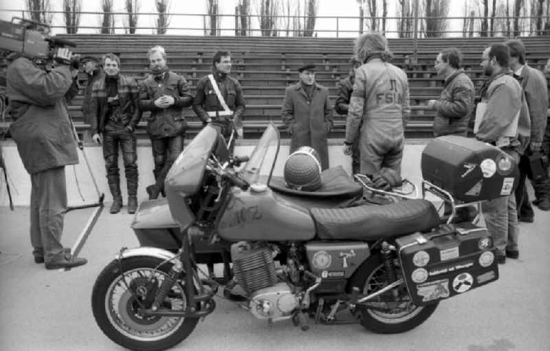 PDS - left - politician Gregor Gysi drives to shooting for an election spot with the sidecar of an MZ - motorcycle on Rennbahnstrasse in the Weissensee district in Berlin East Berlin on the territory of the former GDR, German Democratic Republic