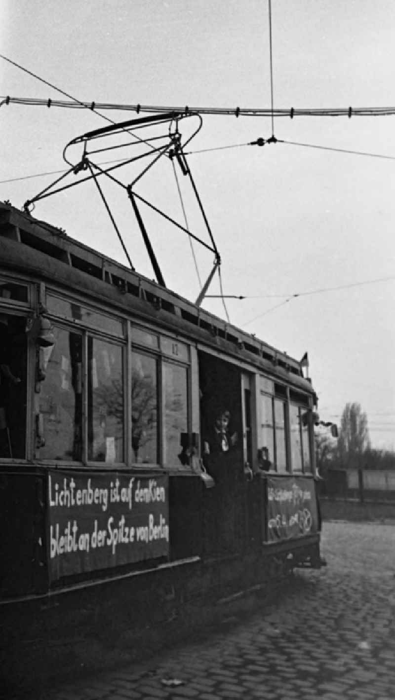 Tram of the TM 36 series with young pioneers and visual advertising for the new GDR constitution in the BVG depot in the district of Pankow on Siegfriedstrasse in the district of Lichtenberg in Berlin East Berlin on the territory of the former GDR, German Democratic Republic
