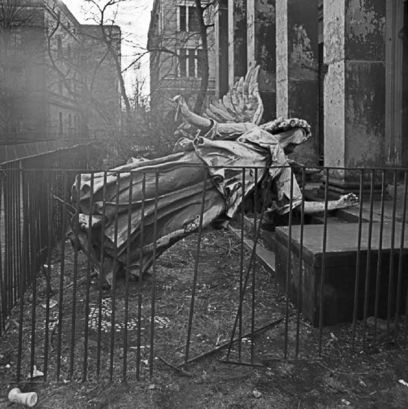 Entrance steps of the Elisabethkirche church with a discarded angel figure from the Berlin Cathedral on Invalidenstrasse - Elisabethkirchstrasse in Berlin East Berlin on the territory of the former GDR, German Democratic Republic