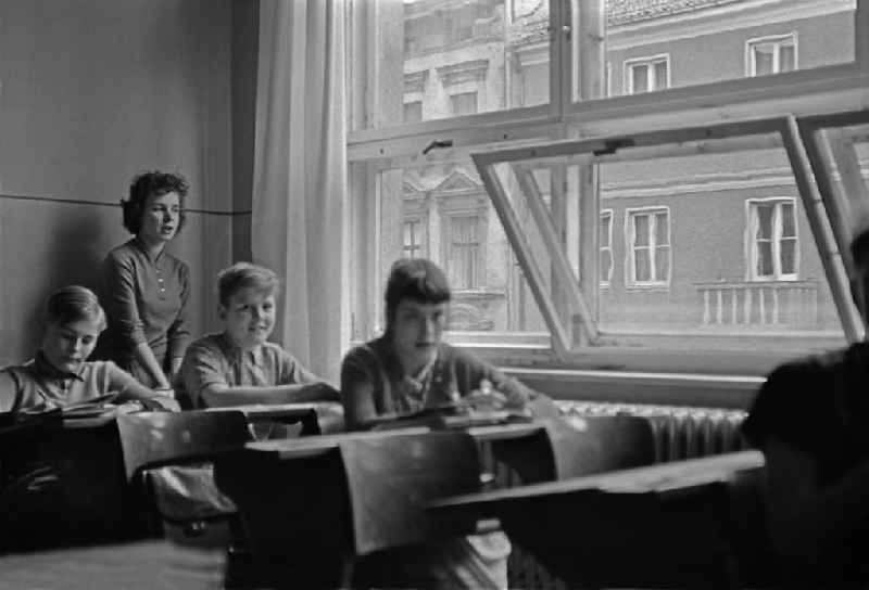 Teaching students in ain a classroom on street Jessnerstrasse in the district Friedrichshain in Berlin Eastberlin on the territory of the former GDR, German Democratic Republic
