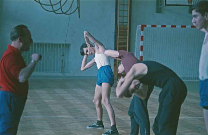 Students in physical education classin a sports hall in Berlin Eastberlin on the territory of the former GDR, German Democratic Republic