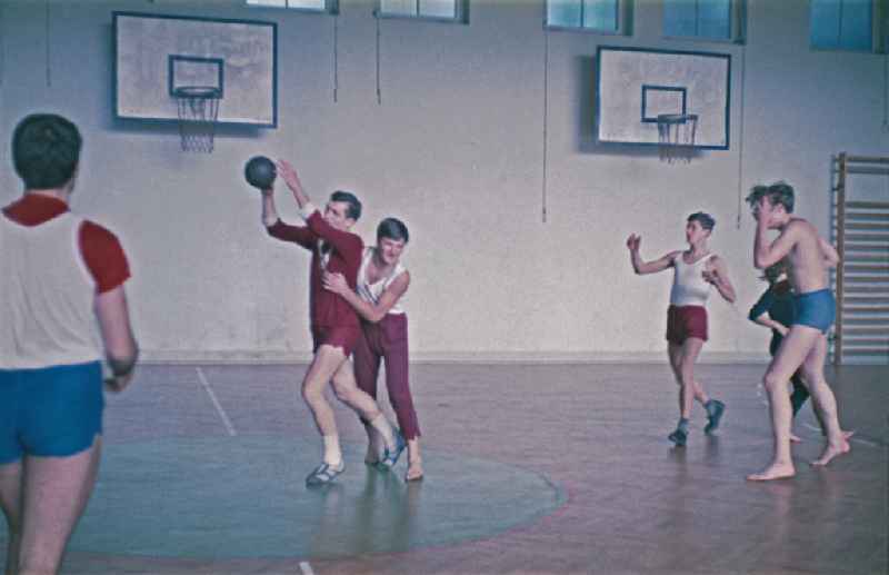 Students in physical education classin a sports hall in Berlin Eastberlin on the territory of the former GDR, German Democratic Republic