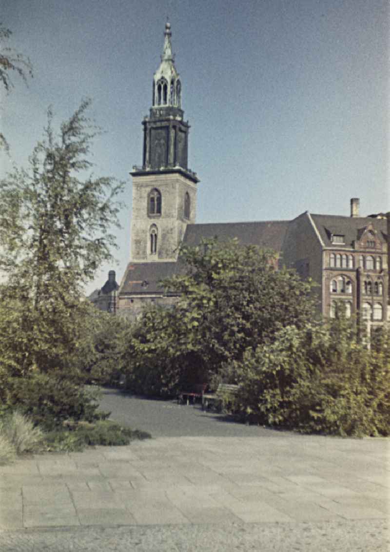 Bell tower of the sacred building of the church ' St. Marienkirche ' on street Karl-Liebknecht-Strasse in the district Mitte in Berlin Eastberlin on the territory of the former GDR, German Democratic Republic