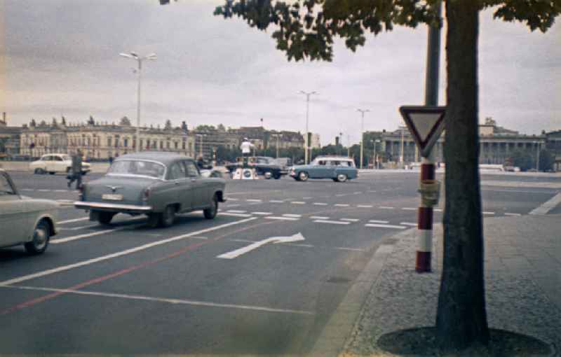 Cars - motor vehicles in traffic at the intersection of Breite Strasse - Schlossplatz in the Mitte district of Berlin East Berlin in the area of ??the former GDR, German Democratic Republic