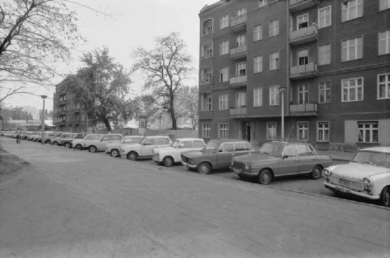 Cars - motor vehicles in a parking lot with the brands Trabant, Wartburg and Lada in front of an apartment building on Corinthstrasse in the Friedrichshain district of Berlin East Berlin on the territory of the former GDR, German Democratic Republic