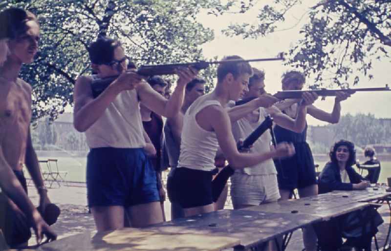 Practical training with a pre-military character in preparation for military service in air rifle shooting on the sports field at Koepenicker Landstrasse 186 in Berlin East Berlin on the territory of the former GDR, German Democratic Republic