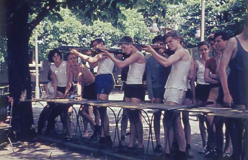 Practical training with a pre-military character in preparation for military service in air rifle shooting on the sports field at Koepenicker Landstrasse 186 in Berlin East Berlin on the territory of the former GDR, German Democratic Republic