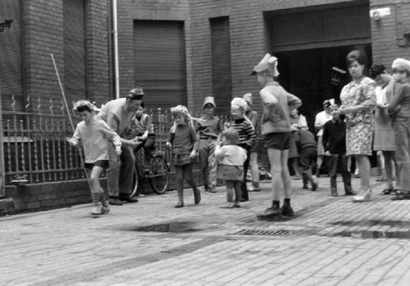 Apartment building courtyard areawith a children's party for Children's Day on street Florastrasse in the district Pankow in Berlin Eastberlin on the territory of the former GDR, German Democratic Republic