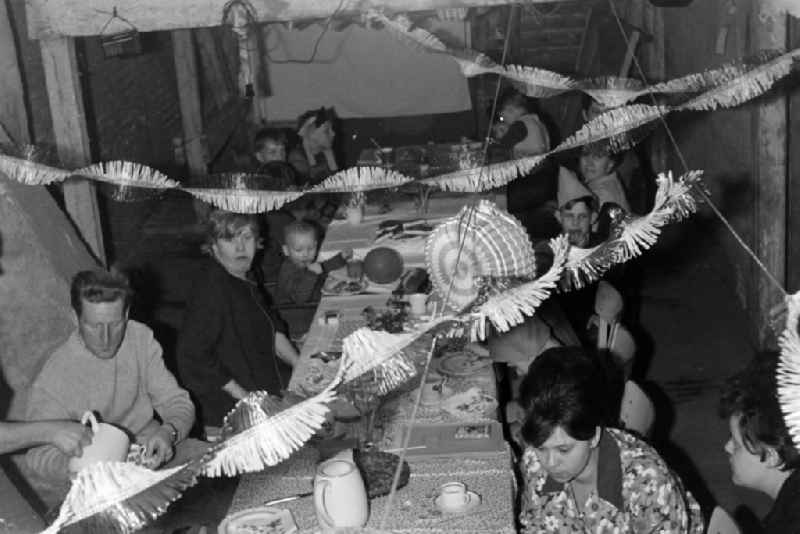 Apartment building attic with children's party for Children's Day on Florastrasse in the Pankow district of Berlin East Berlin in the area of ??the former GDR, German Democratic Republic