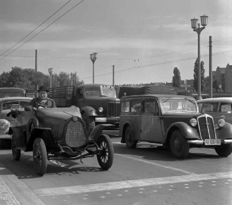 Cars and traffic police at a street intersection in Berlin-Mitte in the territory of the former GDR, German Democratic Republic