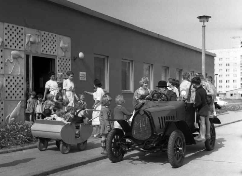 Vintage car F5 from the automobile manufacturer MAF in front of a kindergarten in Berlin-Mitte in the area of the former GDR, German Democratic Republic