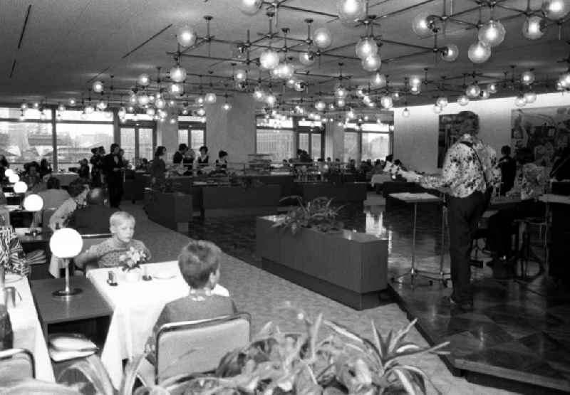 Young guests in the restaurant and pub in the Palace of the Republic in Berlin East Berlin on the territory of the former GDR, German Democratic Republic