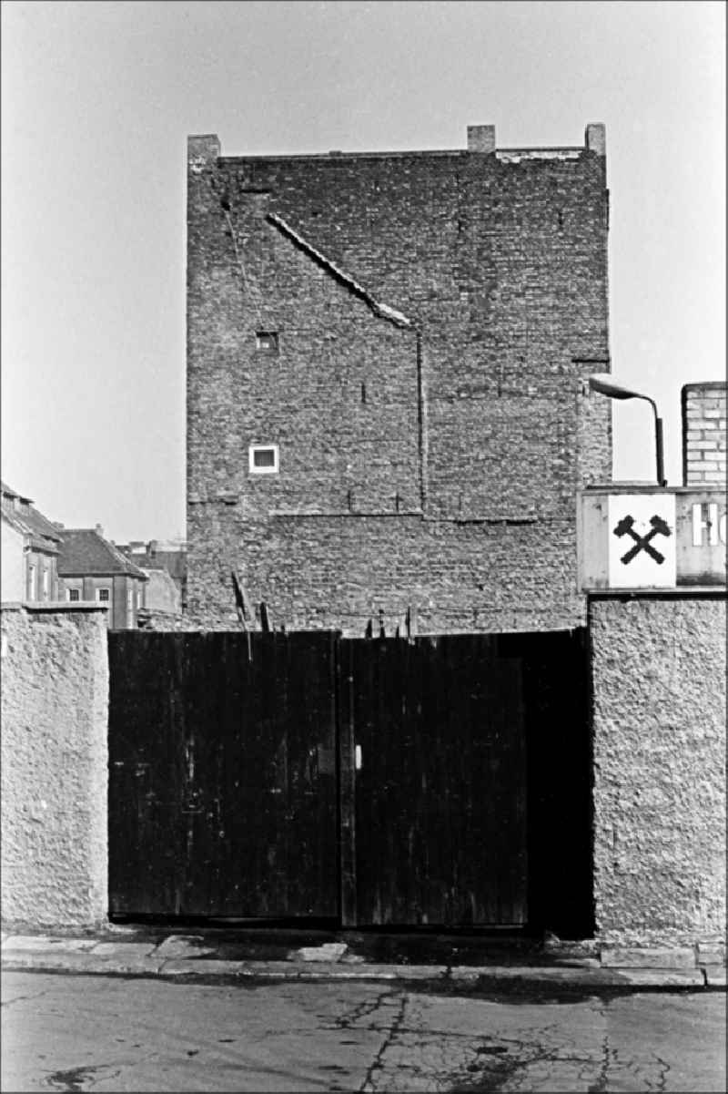 Gate to the entrance area of the coal trade on Steinstrasse in the Mitte district of Berlin East Berlin in the territory of the former GDR, German Democratic Republic