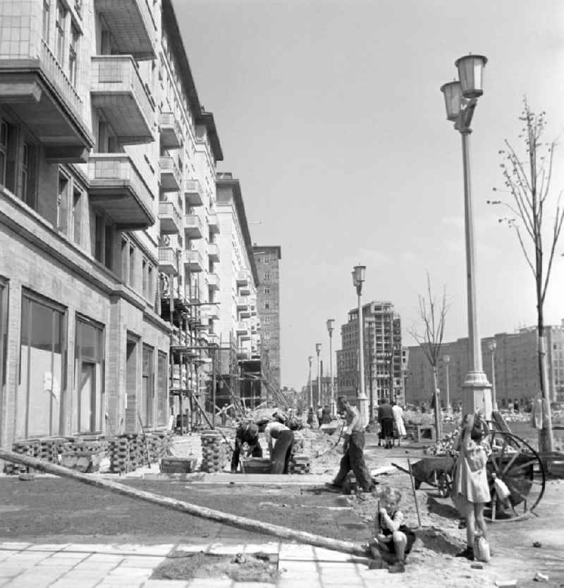 Construction work in the newly built Stalinallee (today Karl-Marx-Allee) in the Friedrichshain district of East Berlin in the territory of the former GDR, German Democratic Republic