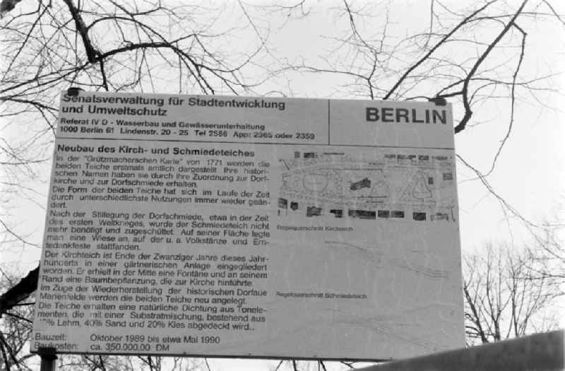 Information board on the new construction of the church and blacksmith pond in the village green Alt-Marienfelde in Berlin