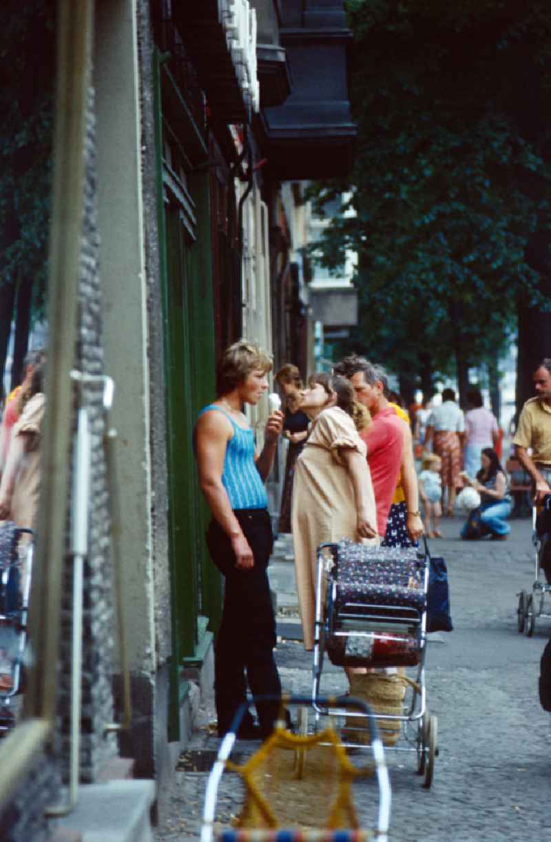 People strolling in East Berlin on the territory of the former GDR, German Democratic Republic
