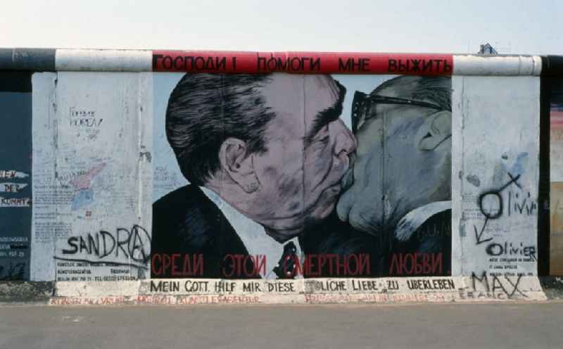 Picture of the contemporary Russian painter Dmitri Vrubel, 'Brother Kiss'. He became known worldwide through his painting 'My God, help me to survive this deadly love' at the Berlin Wall, the 'brotherly kiss' between Leonid Brezhnev and Erich Honecker
