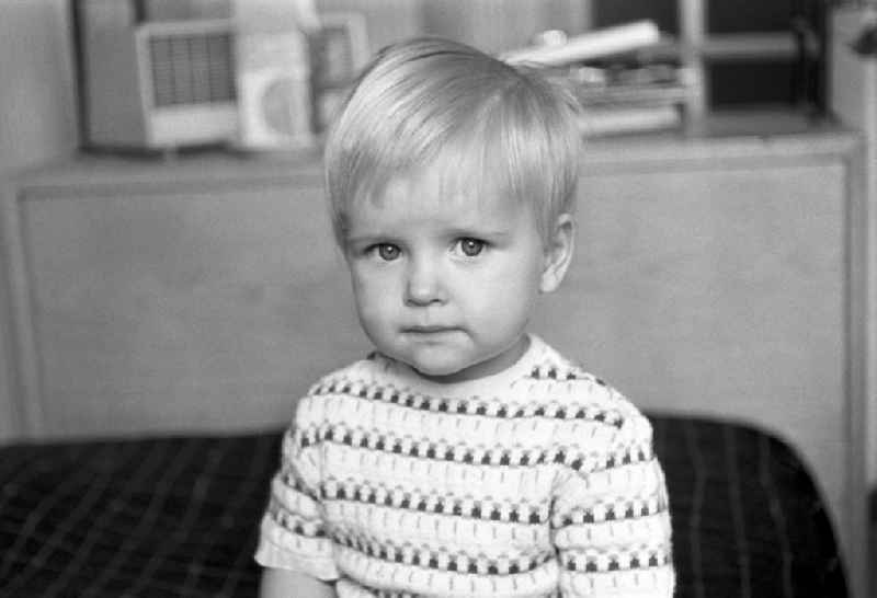 A little blond boy with knit sweater in Berlin - Friedrichshain