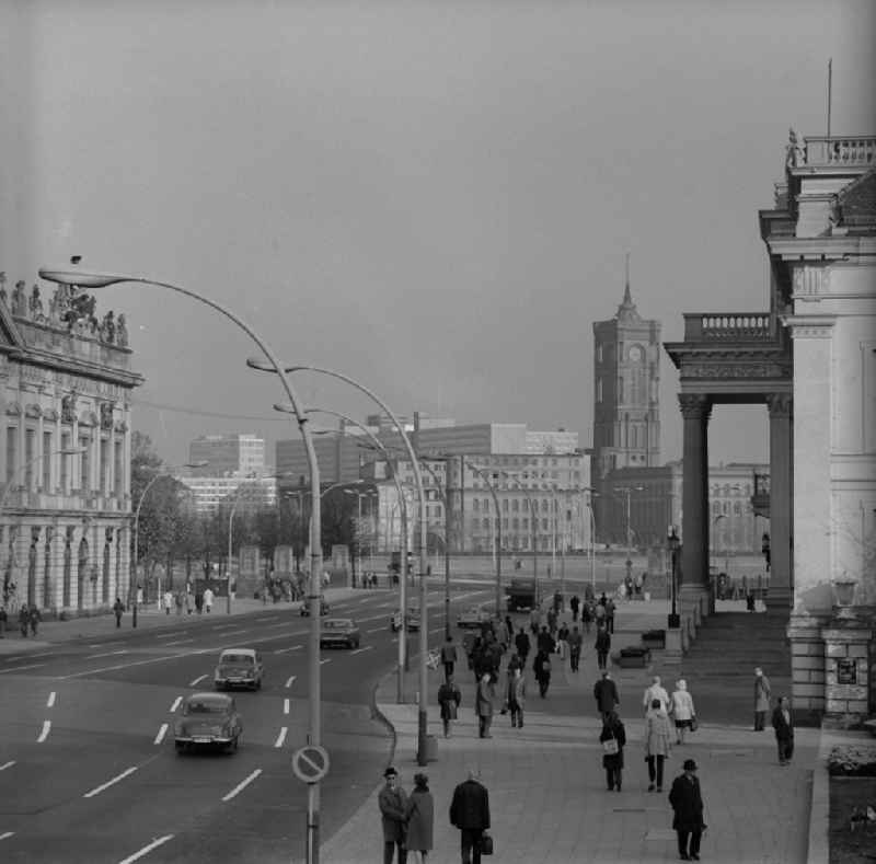 The main highway 'Unter den Linden' in Berlin - Mitte with views of the Red Town Hall. On the left the armory, right the Komische Oper and the frontal newly built Rathauspassagen in the city center of East Berlin