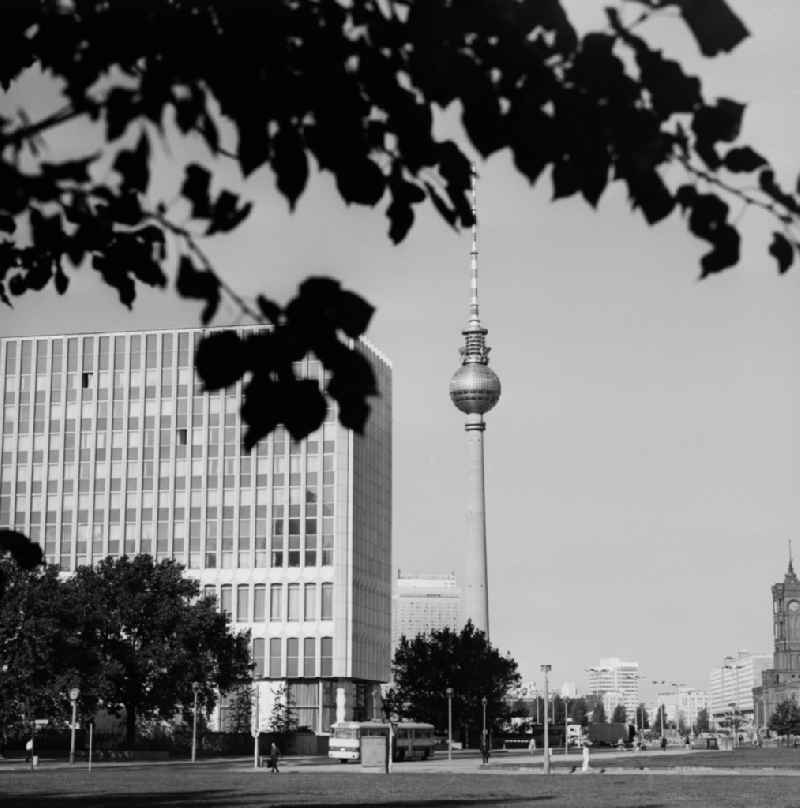 View towards TV tower with the buildings of the Ministry of Foreign Affairs ( MFAA ) and the 'Hotel Stadt Berlin'. On the right side the 'Red Town Hall' of Berlin and the Rathauspassagen