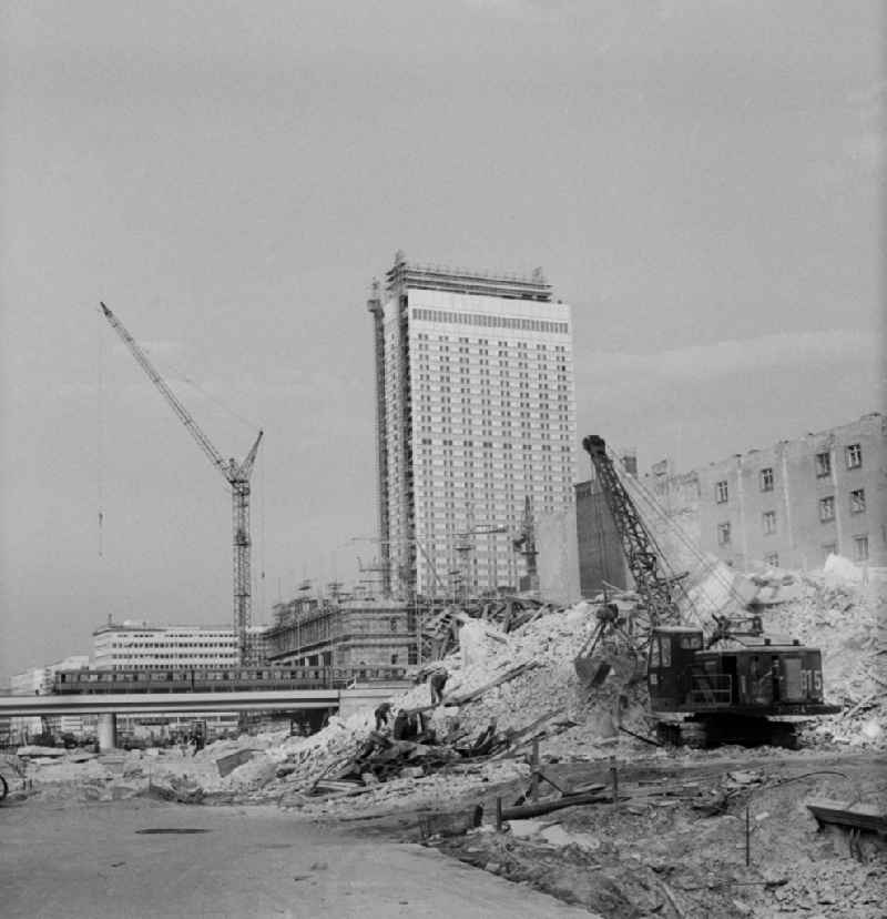 Extensive demolition of buildings at the Kaiser-Wilhelm-Straße today Karl-Liebknecht-Straße in Berlin - Mitte. In the background the newly built 'Hotel Stadt Berlin'