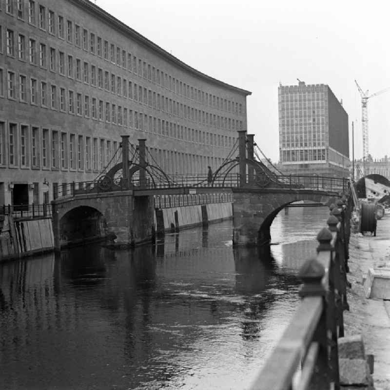 View from the bridge over the Spree Gertraud toward construction of the Ministry of Foreign Affairs in Berlin - Mitte. In between is the historical virgin bridge. It is the oldest bridge in Berlin