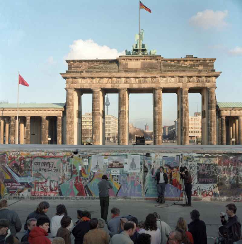 View of the still existing barrier of the Berlin Wall at the Brandenburg Gate from West Berlin to East Berlin. The wall is demolished, however, here only in June 199