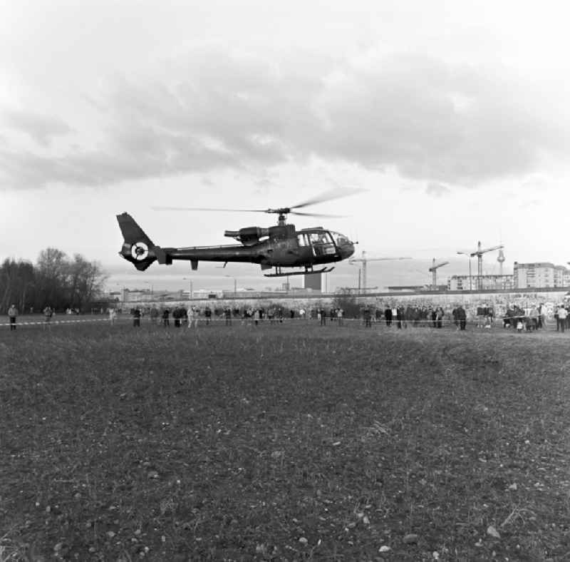 A British military helicopter lands on the open space at Potsdamer Platz in Berlin. The Army Air Corps (AAC) of the British Army, the Army Air Corps of the United Kingdom. Here's an observation helicopter Gazelle AH1