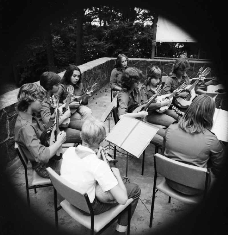 The folk instrument orchestra / Chamber Orchestra from the House of the Young Pioneers 'German Titov' during an appearance in Biesenthal in Brandenburg on the territory of the former GDR, German Democratic Republic