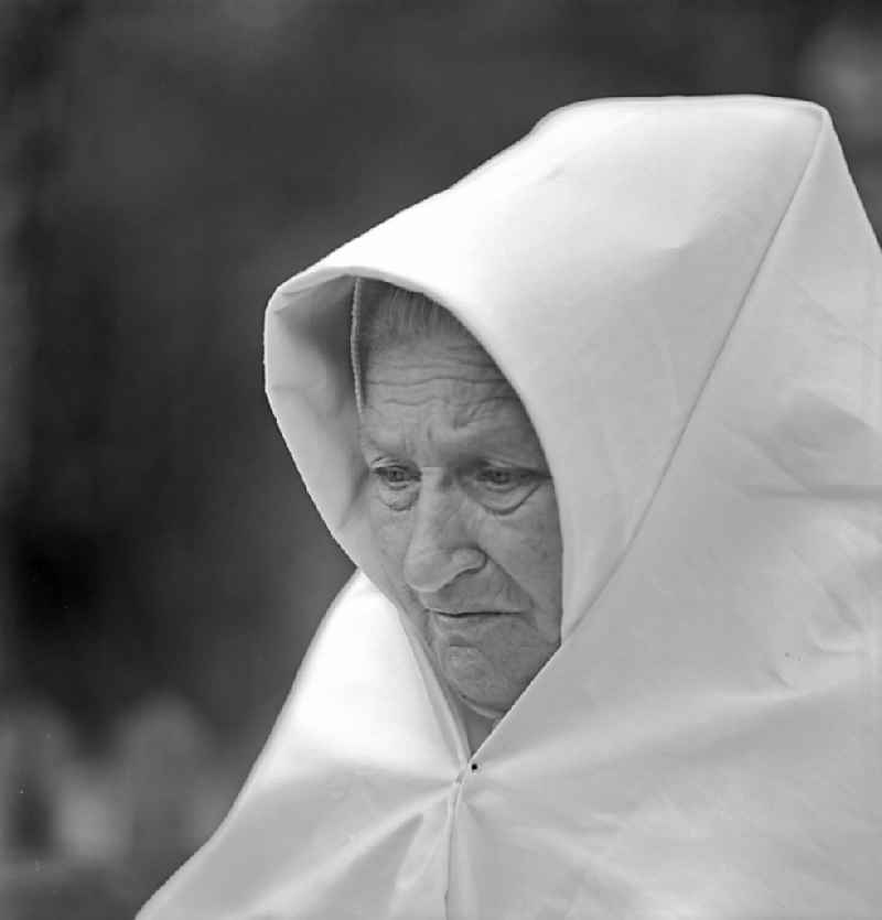 Portrait of an old Sorbin with a white mourning cloak in the Spray district of Boxberg in GDR
