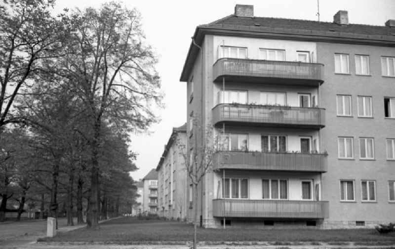 New buildings on the corner of Comeniusstrasse and Rudolf-Mauersberger-Strasse in the Striesen district in Dresden in the state Saxony on the territory of the former GDR, German Democratic Republic. Advertising pillar stands by the road