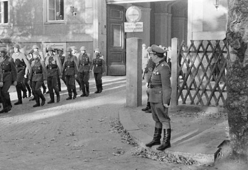 March of soldiers and officers der NVA Nationale Volksarmee on street Koenigsbruecker Strasse in Dresden, Saxony on the territory of the former GDR, German Democratic Republic
