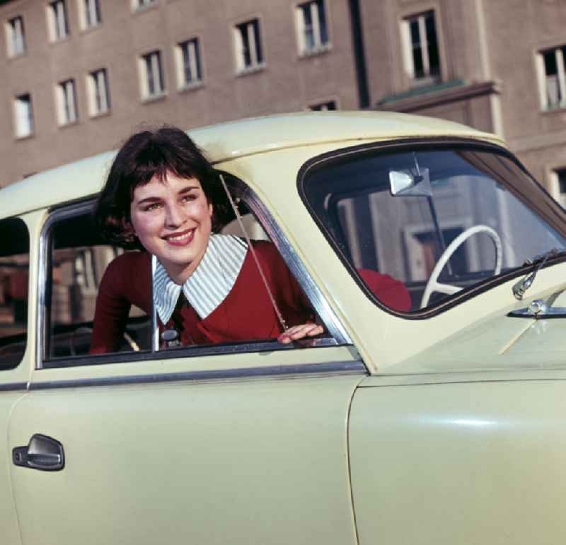 A model poses at a car AWZ P5
