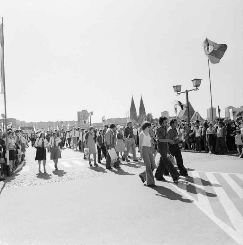 Teenagers on the 'Bridge of Friendship' at the Pentecost meeting of the FDJ in Frankfurt (Oder) in Brandenburg in the area of the former GDR, German Democratic Republic. Here on the Polish side, in Slubize, facing in the direction of Frankfurt / Oder