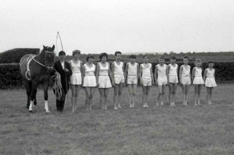 Show program on the track: children's vaulting group Gotha in Gotha in the state Thuringia on the territory of the former GDR, German Democratic Republic