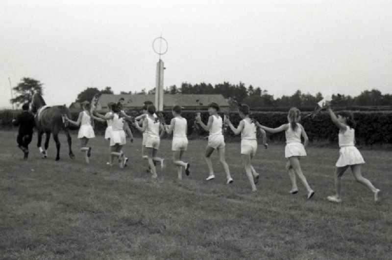 Show program on the track: children's vaulting group Gotha in Gotha in the state Thuringia on the territory of the former GDR, German Democratic Republic