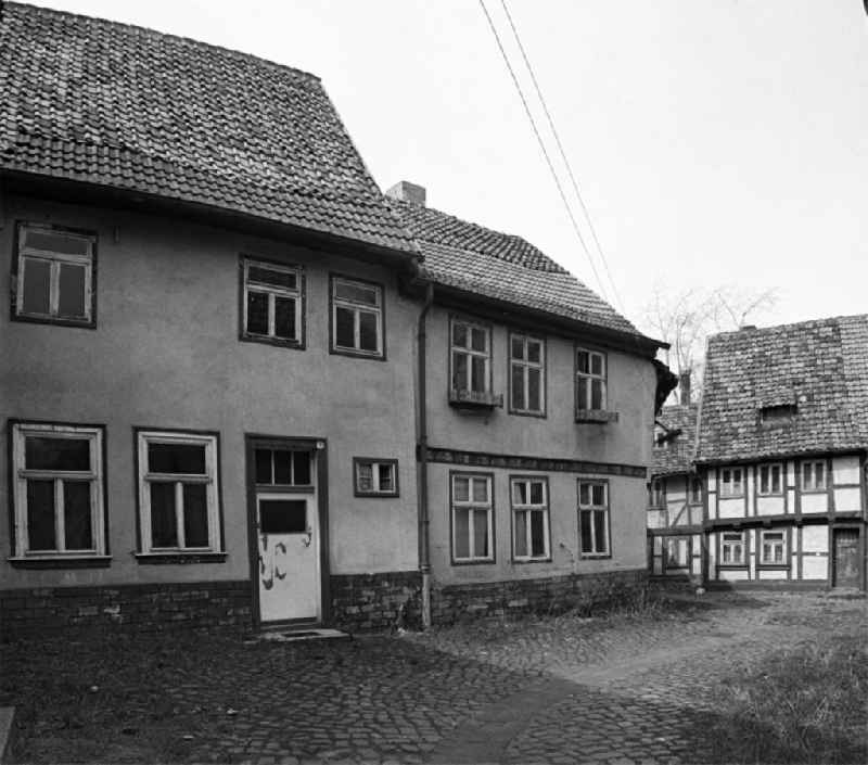 Street view of an apartment building - building front ' Grauer Hof ' in Halberstadt in the state Saxony-Anhalt on the territory of the former GDR, German Democratic Republic
